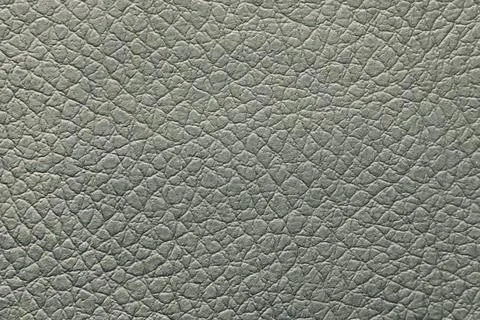 Grey leather texture. Background closeup. Top view Stock Photos