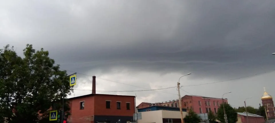 Grey lingering clouds Foto stock