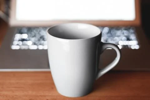 Grey mug on the table Stock Photos