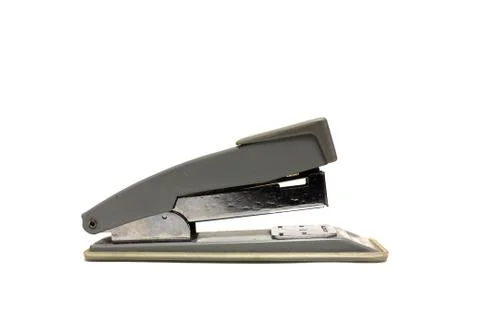Grey office stapler on white background Stock Photos