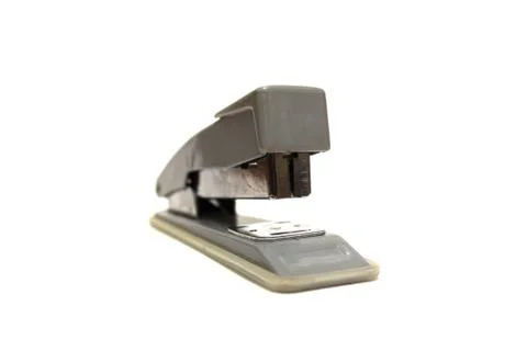 Grey office stapler on white background Stock Photos