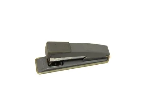 Grey office stapler on white background Stock Photos