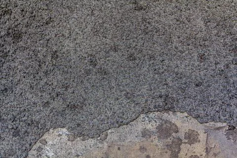 Grey old wall. The plaster is falling. Climbed plaster Stock Photos