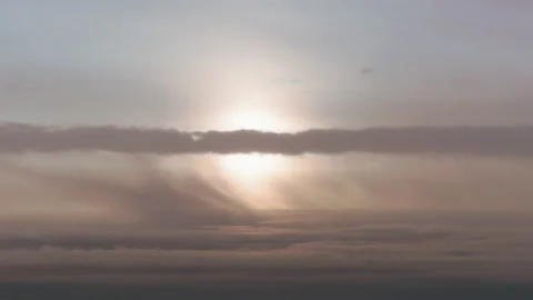 Grey overcast cloudy sky covers the sun on the horizon Stock-Footage 144635812