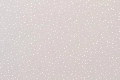 Grey paper background with a pattern of snow. 스톡 사진