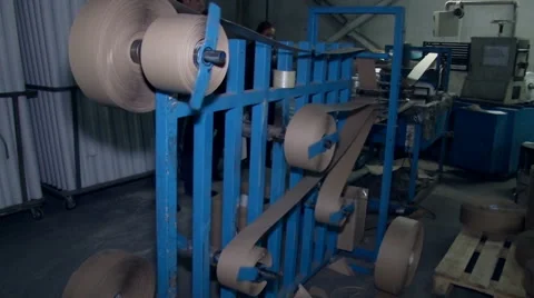 Grey paper rolls on the machine Stock Footage 64856182
