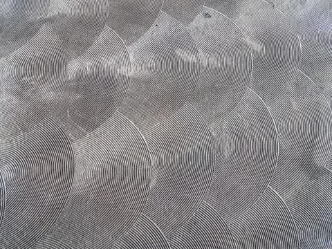 Grey pavement or cement with circular pattern Stock Photos