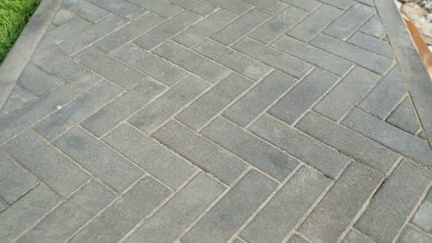 Grey paving stones in a herringbone pattern on an urban walkway. Stock Footage 331540836