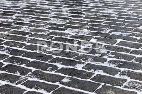 Grey Paving Stones Of The Red Square In Moscow In Winter Time As Background