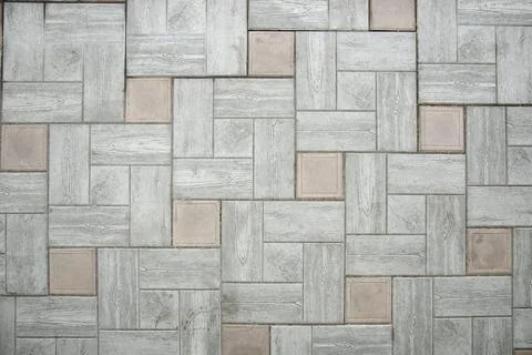 Grey paving tiles texture background . Selective focus Stock Photos