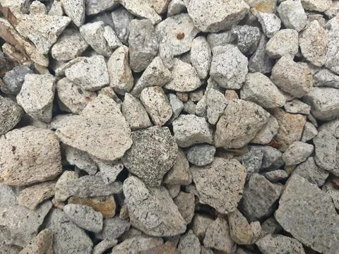 Grey pebbles background in horizontal angle Stock Photos