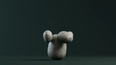 Grey pebbles magically stick to rock. Stockbeeldmateriaal 327911095