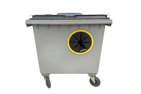 Grey plastic trash container with wheels isolated on white background Stock Photos