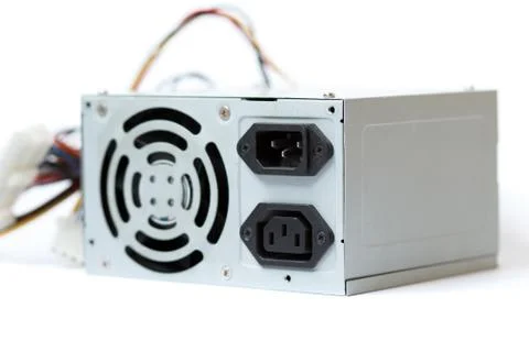 Grey power supply for the computer with cables unit for pc on white backgroun Stock Photos