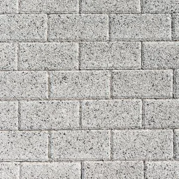Grey rectangle pavement tiles. Texture background. Stock Photos
