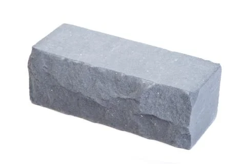 Grey relief ceramic brick at the white background, isolated Stock Photos