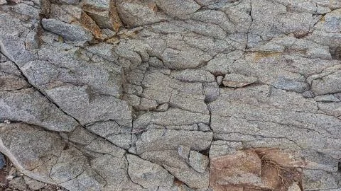A Grey Rough Surface of the Boulder, Stone or Rock, beautiful Texture Stock Photos