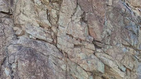 A Grey Rough Surface of the Boulder, Stone or Rock, beautiful Texture Stock Photos