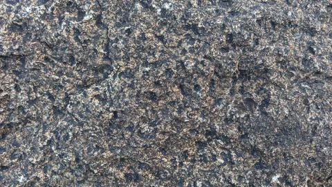 A Grey Rough Surface of the Boulder, Stone or Rock, beautiful Texture Stock Photos