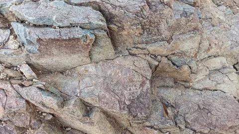 A Grey Rough Surface of the Boulder, Stone or Rock, beautiful Texture Stock Photos