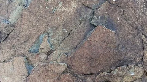 A Grey Rough Surface of the Boulder, Stone or Rock, beautiful Texture Stock Photos