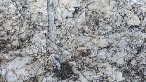 A Grey Rough Surface of the Boulder, Stone or Rock, beautiful Texture Stock Photos