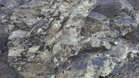A Grey Rough Surface of the Boulder, Stone or Rock, beautiful Texture Stock Photos