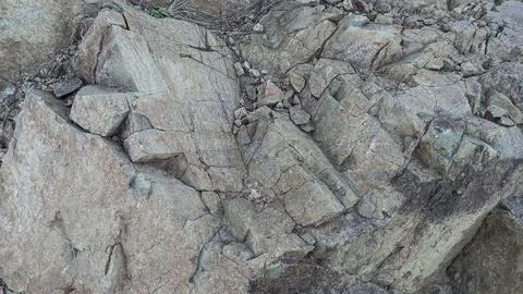 A Grey Rough Surface of the Boulder, Stone or Rock, beautiful Texture Stock Photos