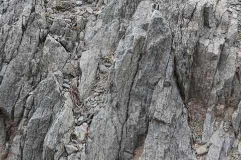 A Grey Rough Surface of the Boulder, Stone or Rock, beautiful Texture Stock Photos