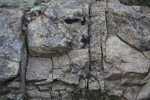 A Grey Rough Surface of the Boulder, Stone or Rock, beautiful Texture Stock Photos