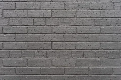 Grey rustic Brick Wall Texture Background. Vintage Effect. Stock Photos