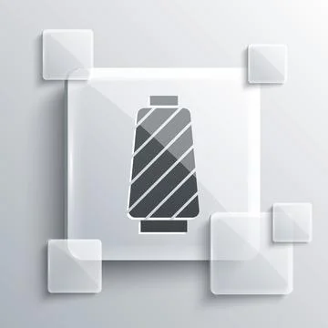 Grey Sewing thread on spool icon isolated on grey background. Yarn spool. Thread Illustrazione stock