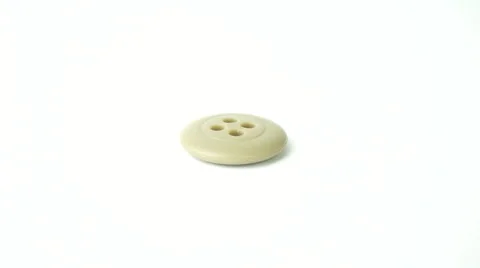 Grey shirt or pants button. Camera rotation surrounding the object. Stock Footage 41864683