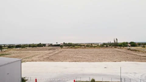 Grey Silos Wheat Bread Production Plant Fly Back Reveal Silos Rural Village in Stock Footage 237357243