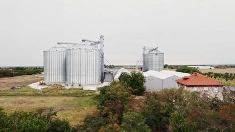 Grey Silos Wheat Bread Production Plant Close Up on Plant Factory Reveal Rural Stock Footage 237357361