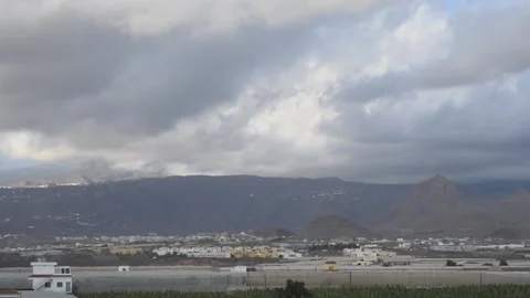 Grey sky and clouds time lapse with houses  Stock Footage 144710560