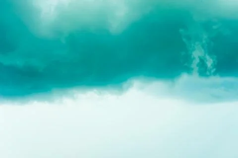 Grey sky with blue clouds Stock Photos