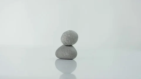 Grey small stones at white background Stock Footage 71844387