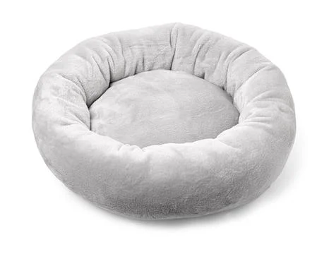 Grey soft round plush pet bed Stock Photos