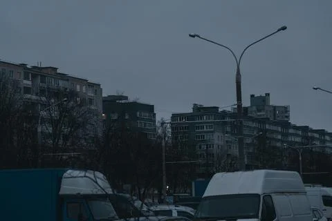 Grey, Soviet panels in the distance in the evening. Minsk in the evening Stock Photos