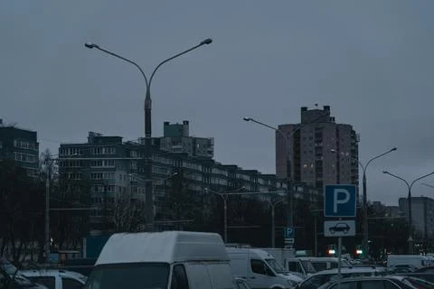 Grey, Soviet panels in the distance in the evening. Minsk in the evening Stock Photos