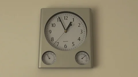 Grey square clock on a wall 動画素材 87719768