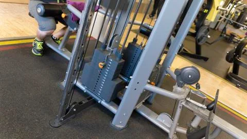 Grey stack of barbell plates in gym sport club Stock Photos
