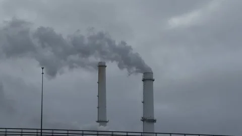 Grey steam going from tubes in winter Stock Footage 260076857