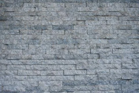 Grey stone brick wall background texture 스톡 사진