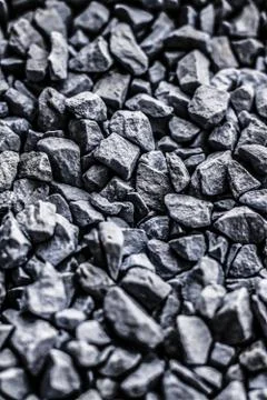 Grey stone pebbles as abstract background texture, landscape architecture bac Stock Photos