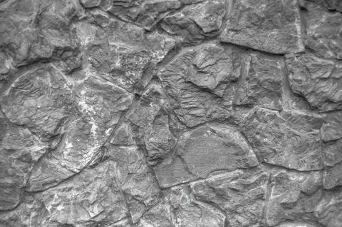 Grey stone textured wall background Stock Photos