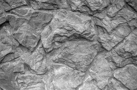 Grey stone textured wall background Stock Photos