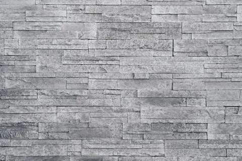 Grey stone wall background Stock Photos