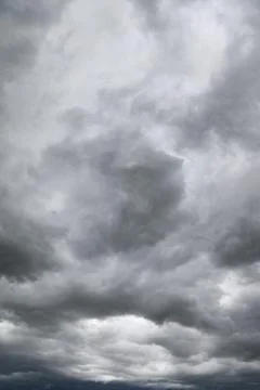 Grey storm clouds in sky Stock Photos